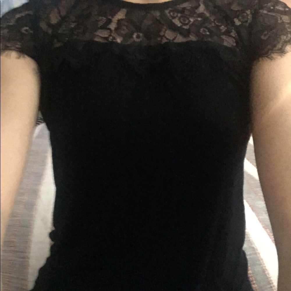Black elegant lace embellished shirt.